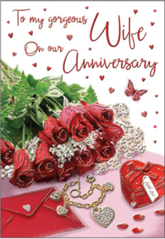 A romantic still-life for an anniversary card is crafted with an attention to detail that feels rooted in Charlton's friendly, village-like character. Central to the composition is a compact bouquet of red roses, their petals velvety and full, each bloom opening in rich, layered spirals of crimson. The roses are surrounded by fresh greenery, the leaves sleek and glossy, providing a natural frame that intensifies the depth of the red tones. Positioned closely beside the flowers is an elegant envelope, soft ivory in colour, its edges crisp and its flap resting lightly, suggesting an intimate handwritten message is tucked inside. Nearby, a heart-shaped box in vivid red captures the light, its surface smooth and rounded, evoking the idea of a treasured gift prepared with care. Around this focal pairing, delicate jewellery is arranged like scattered memories-a fine chain, maybe a tiny pendant-each piece catching small highlights and adding a quiet hint of luxury. Tiny hearts drift across the card's background, some rendered as sparkles, others as simple crimson shapes, creating a playful yet gently romantic pattern. A single butterfly detail appears at one edge of the scene, its presence delicate and almost weightless, as though it has just fluttered down among the petals. Soft, warm lighting bathes the entire arrangement, emphasizing the texture of the roses, the sheen of the metal, and the subtle grain of the paper, while casting tender shadows that make the scene feel three-dimensional. The mood is thoughtful and affectionate, like an anniversary surprise chosen from Florist Charlton for someone who has shared years of laughter, comfort, and everyday moments in the homes and streets around the SE7 area.
