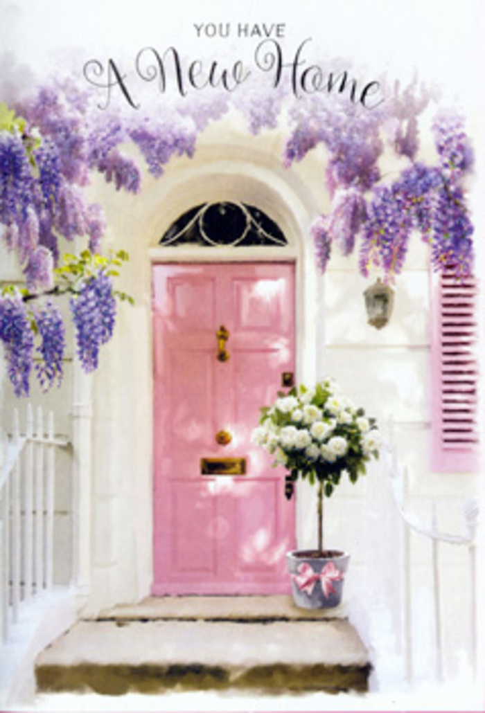 Set against the peaceful backdrop of a Charlton side street, this doorway composition tells a gentle story of first steps into a new home. At the centre is a well-loved front door painted in a soft, pastel pink, its surface smooth but not glossy, allowing the light to settle on it in a warm, velvety way. The door is flanked by whitewashed walls that soften the entire scene, while a nearby shutter in a slightly lighter blush echoes the same palette, tying together every element into a calm, cohesive whole. Above, wisteria pours down in free-flowing cascades, its clusters of blossoms rendered in tender shades of lavender, lilac, and muted mauve. The flowers hang in layers, some pressed closer to the wall, others reaching outward, giving depth and movement as if a light Charlton breeze is gently stirring them. Down at the threshold, resting squarely on the stone step, stands a tall tin bucket in a cool, understated grey. Its simple, slightly worn finish suggests practicality and charm rather than showiness. From within, a curated bouquet of creamy white roses emerges, their petals plush, layered, and softly ruffled at the edges. Sprigs of fresh greenery weave among the roses, adding touches of verdant contrast that make the whites appear even more luminous. A slim ribbon in a delicate rose-pink wraps the bucket near its base, tied into an elegant bow whose ends trail onto the step, echoing the romantic tones of the door and wisteria. The atmosphere is one of hopeful calm - the sort of floral welcome a Charlton florist might prepare for a couple moving into their first home near Charlton Station, a quiet promise that the space beyond this door will soon be filled with memories, shared meals, and laughter.