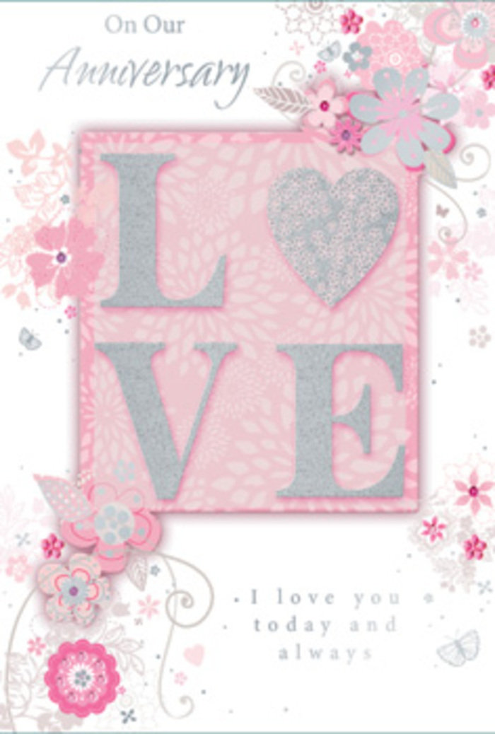 The anniversary card displayed here feels like stepping into a soft, sunlit room in Charlton, where love is honoured in small, everyday gestures. At the heart of the design, the word LOVE stretches across the card in an elegant typeface, its surface coated with frosted glitter that creates a slightly rough, sparkling texture. When the light hits, the letters gleam in a restrained yet playful way, suggesting a sense of celebration. Around this central word, wispy, hand-drawn blooms and trailing leaves drift along the borders, their hues gently shifting between blush pink, lilac, ivory, and the palest of greys. The flowers are stylized rather than botanical, sketched with thin, curving lines and shaded with a soft, almost powdery touch, much like a florist in Charlton might doodle ideas for a hand-tied anniversary bouquet. Among the petals, fine flourishes appear-filigree curls, delicate leaves, and faint butterflies almost hidden among the lines-hinting at quiet movement and the flutter of contented hearts. The background is a warm blush-pink field that allows every detail to stand out without harsh contrast, like the soft walls of a cosy Charlton sitting room. Nestled within the composition, the phrase I love you today and always is set in a graceful, understated type, anchoring the design with heartfelt sincerity. The card feels like a bouquet translated into paper: balanced in colour and form, gently radiant, and full of gratitude for shared days. Paired with a fresh floral arrangement delivered locally by Florist Charlton, it would mark an anniversary with both elegance and warmth.